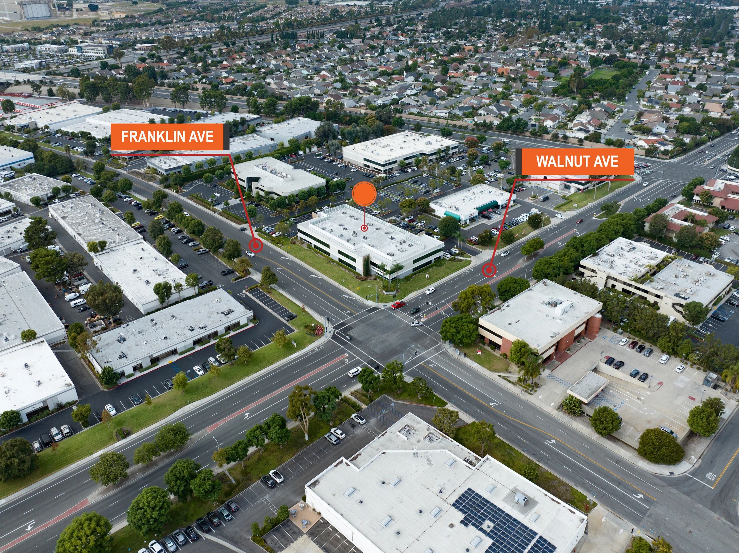 Aerial view of the surrounding commercial area
