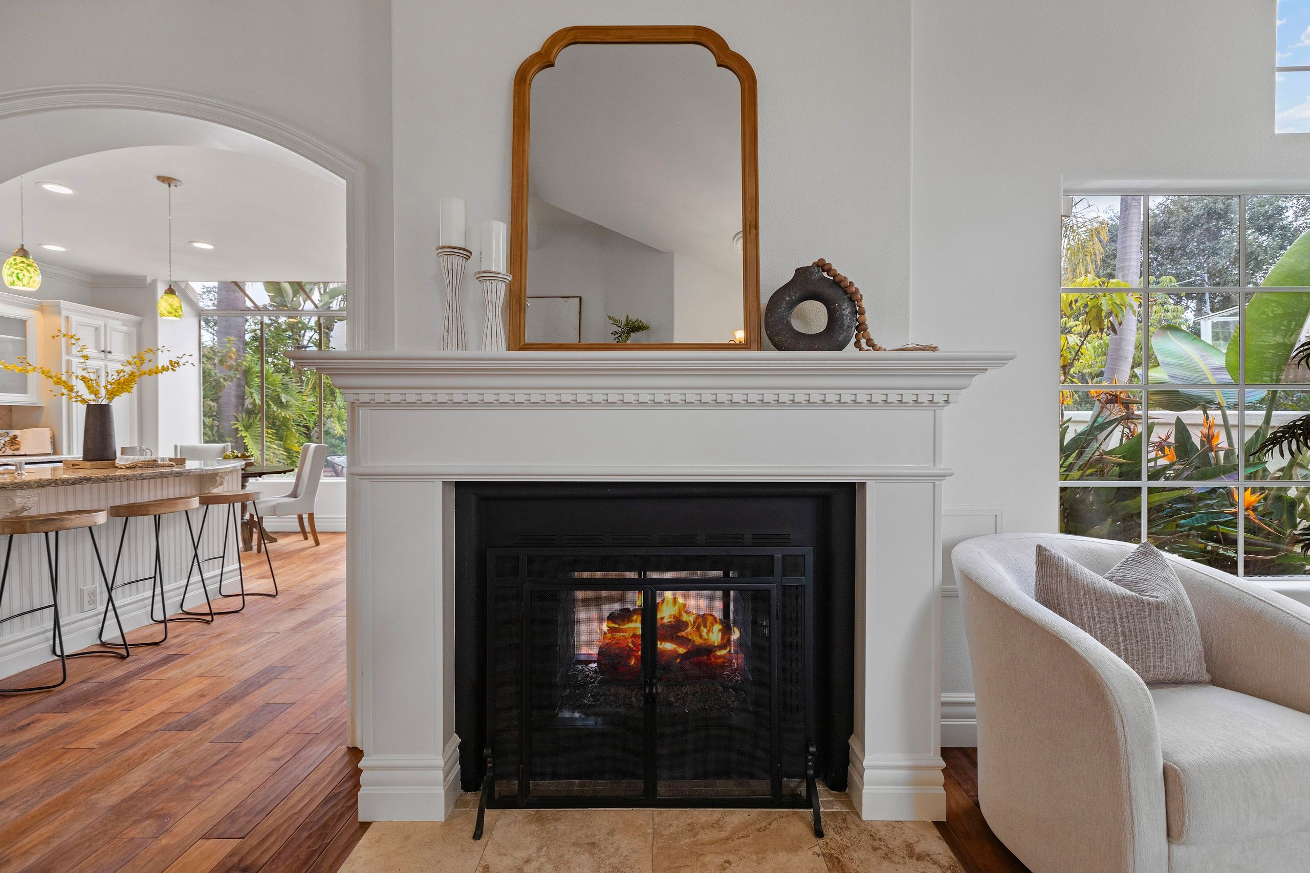 Living room with white fireplace mantel