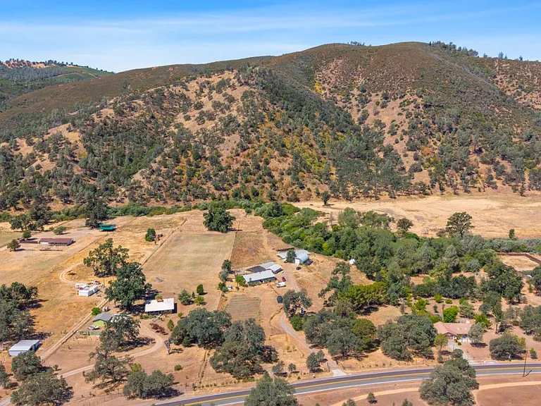 Aerial view of the 19.26-acre ranchette and surrounding hills in Clearlake Oaks